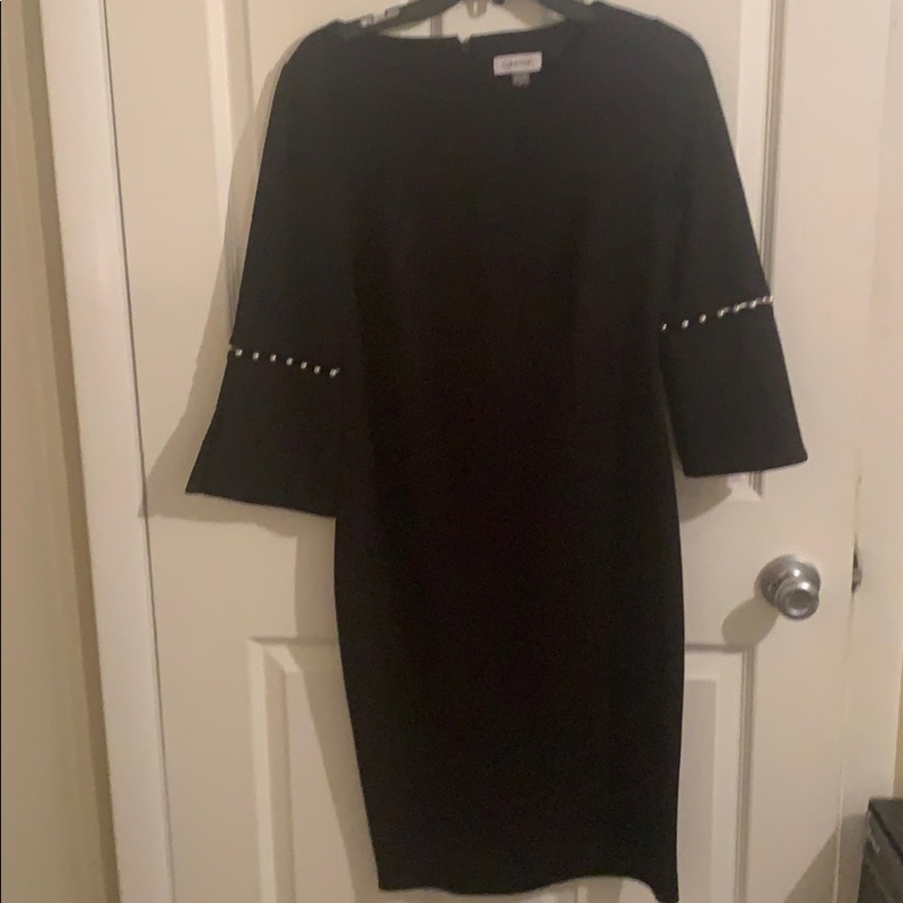 Black Calvin Klein dress with pearl bell sleeves